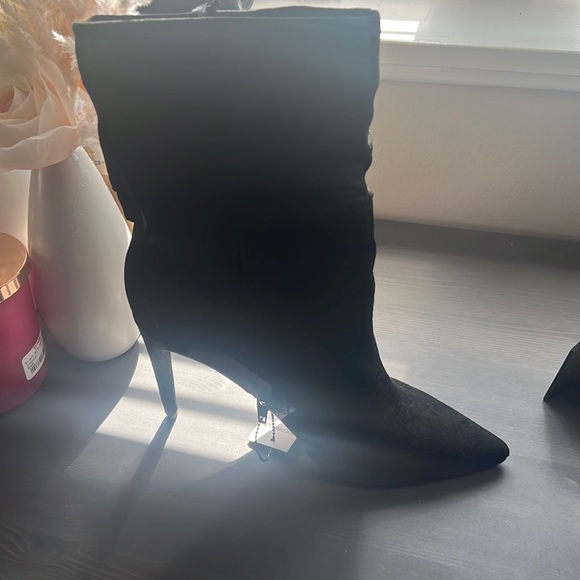 Express Shoes - Women Express black boots with heels. Size 7